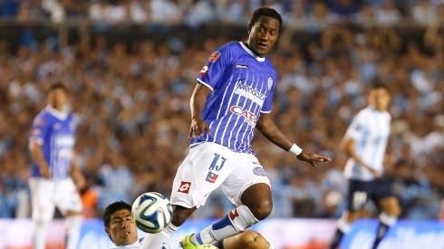 BUENOS AIRES, ARGENTINA - DECEMBER 14:  Jaime Ayovi of Godoy Cruz fights for the ball with Luciano Lollo of Racing Club during a match between Racing Club and Godoy Cruz as part of 19th round of Torneo de Transicion 2014 at Presidente Peron Stadium on December 14, 2014 in Buenos Aires, Argentina. (Photo by Gabriel Rossi/LatinContent/Getty Images)-Not Released (NR)